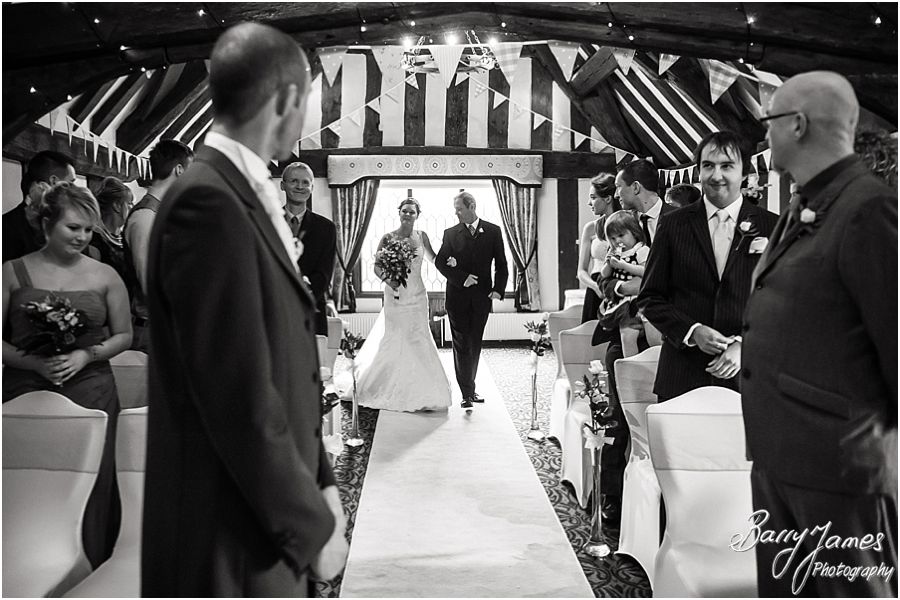 Capturing the beautiful wedding ceremony with contemporary and candid photographs at The Moat House in Acton Trussell by Full Time Professional Wedding Photographer Barry James