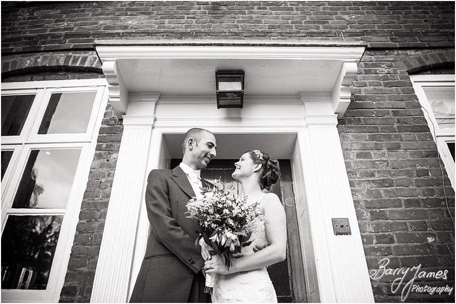 Contemporary stunning portrait photographs of bride and groom by the lake at The Moat House in Acton Trussell by Stafford Wedding Photographer Barry James