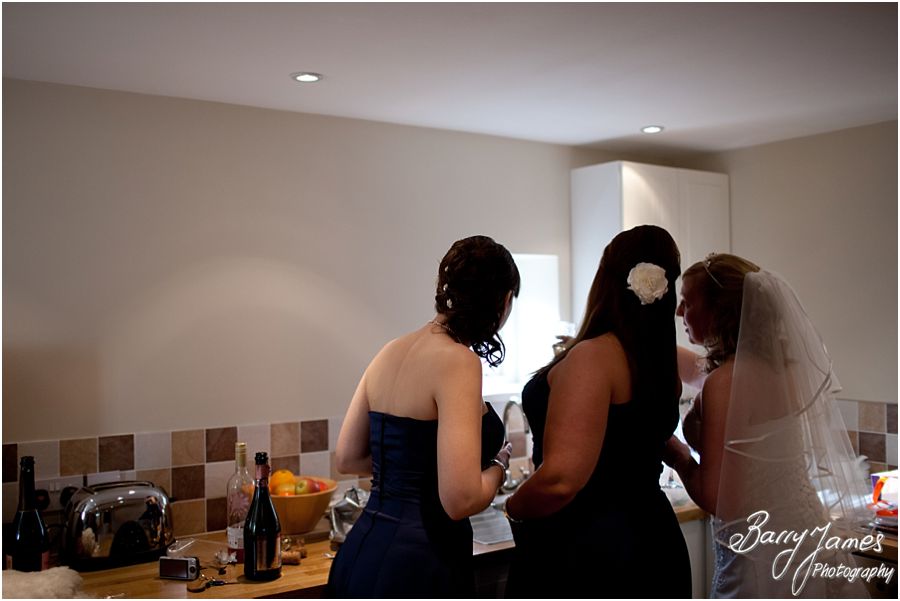 Candid photographs of Bride and Bridesmaids ahead of ceremony at Packington Moor in Lichfield by Staffordshire Wedding Photographer Barry James
