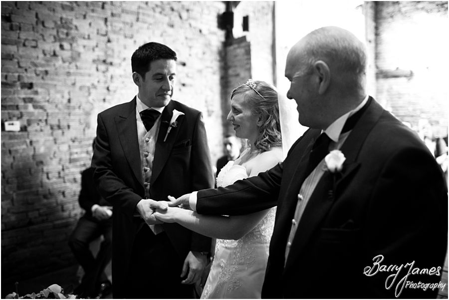 Photographs of wedding ceremony in Oat Barn at Packington Moor in Lichfield by Stafford Wedding Photographer Barry James