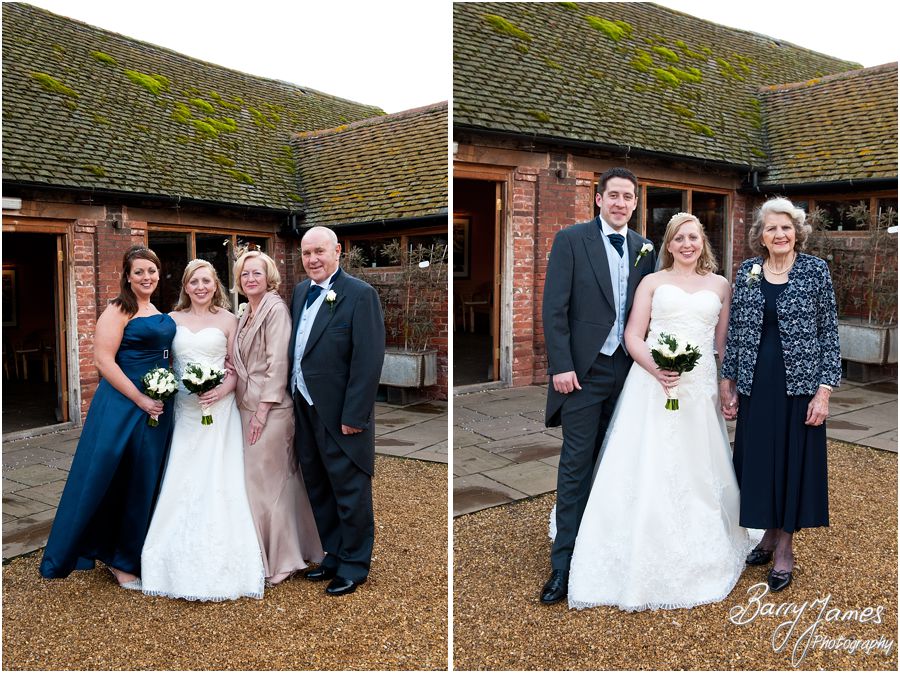 Relaxed group photographs of family in courtyard at Packington Moor in Lichfield by Award Winning Wedding Photographer Barry James