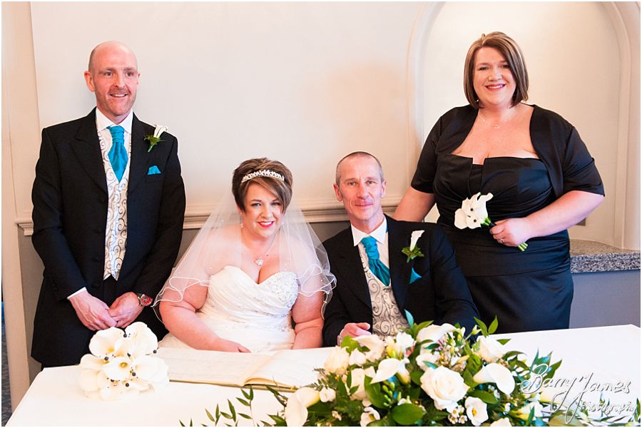 Reportage photographs during wedding ceremony in Shrewsbury Suite at Weston Hall in Stafford by Recommended Staffordshire Wedding Photographer Barry James