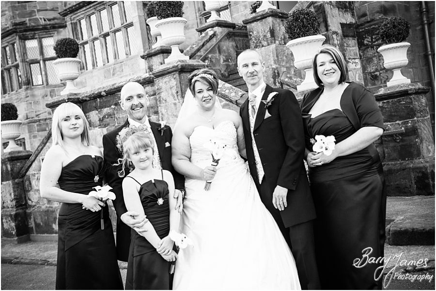 Relaxed family groups during drinks reception at Weston Hall in Stafford by Contemporary Staffordshire Wedding Photographer Barry James