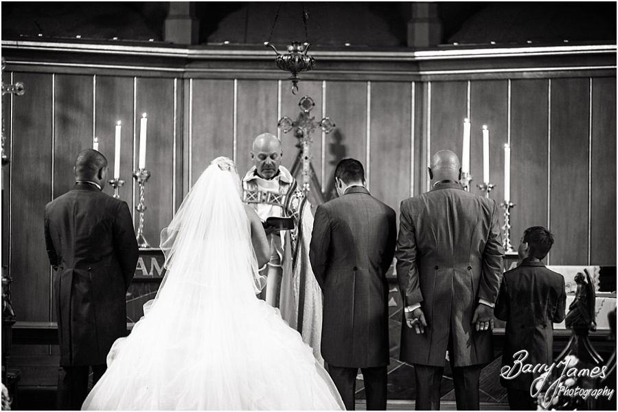 Natural storytelling wedding photography of a wet summer wedding at the Collegiate Church in Wolverhampton by Wolverhampton Wedding Photographer Barry James