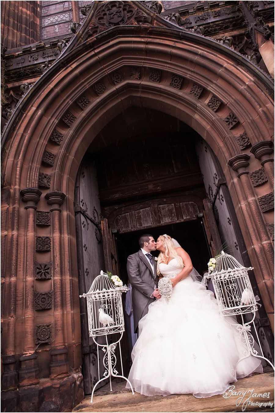 Natural storytelling wedding photography of a wet summer wedding at the Collegiate Church in Wolverhampton by Wolverhampton Wedding Photographer Barry James