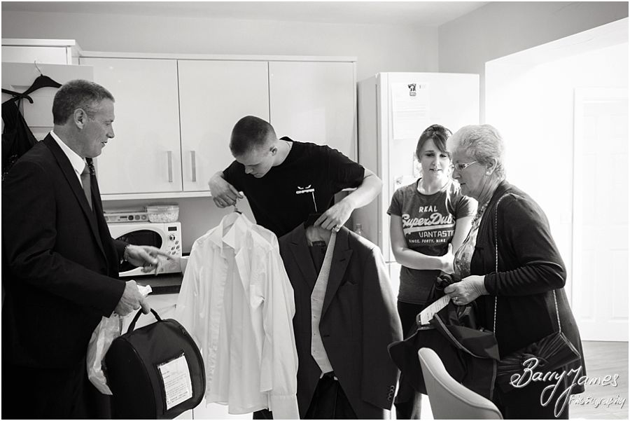 Reportage photographs of wedding morning preparations at Brides home in Willenhall by Contemporary Candid and Creative Wedding Photographer Barry James