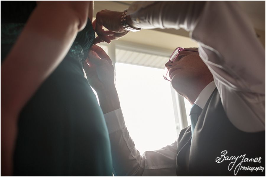Candid photographs of the drama and excitement of wedding morning at Brides home in Willenhall by Contemporary Candid and Creative Wedding Photographer Barry James