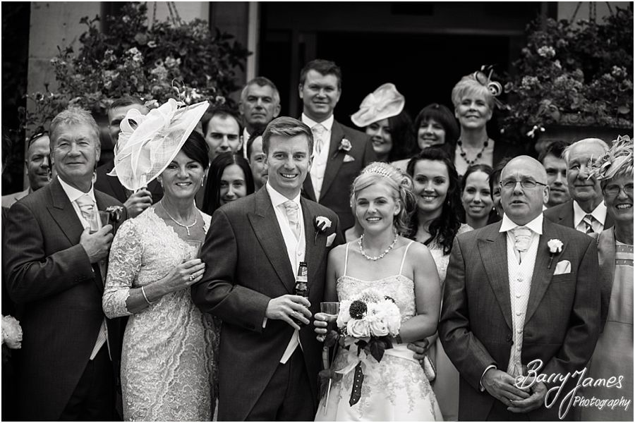 Relaxed family photographs during drinks reception at Rodbaston Hall in Penkridge by Cannock Wedding Photographer Barry James
