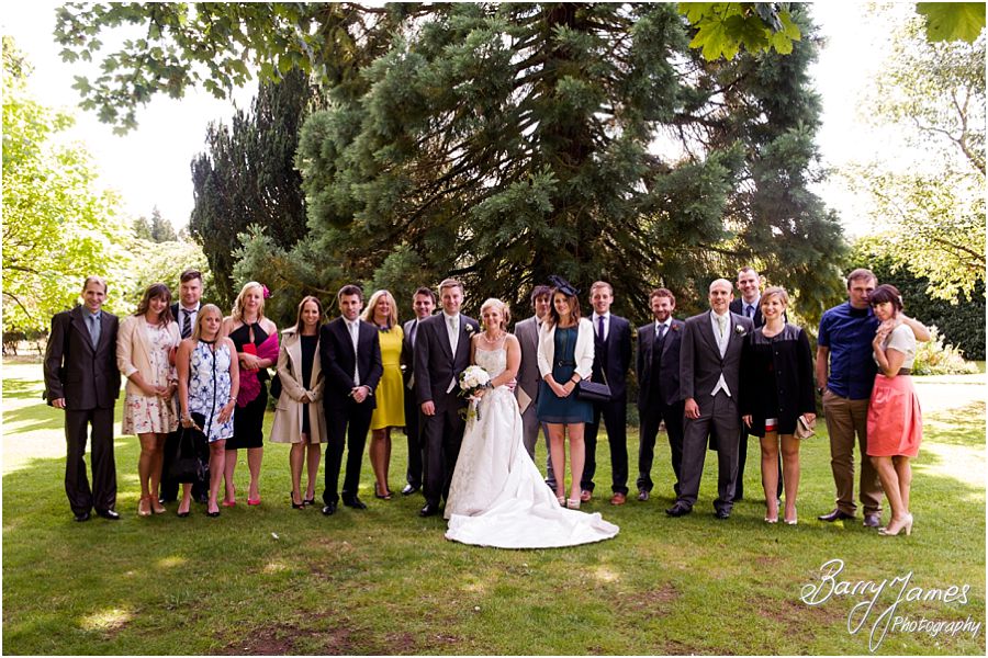 Relaxed family photographs during drinks reception at Rodbaston Hall in Penkridge by Cannock Wedding Photographer Barry James