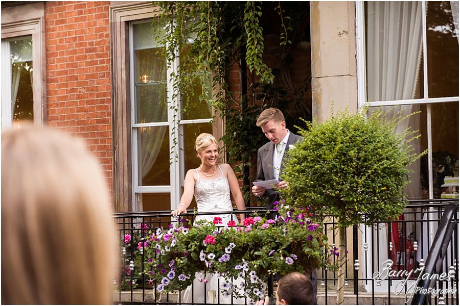Telling the wedding story with fabulous candid photographs of guests during wedding reception at Rodbaston Hall in Penkridge by Cannock Wedding Photographer Barry James