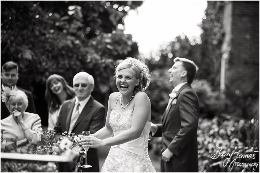 Candid photographs of the speeches capture the wonderful emotion and reaction of the guests and the wedding party at Rodbaston Hall in Penkridge by Cannock Wedding Photographer Barry James