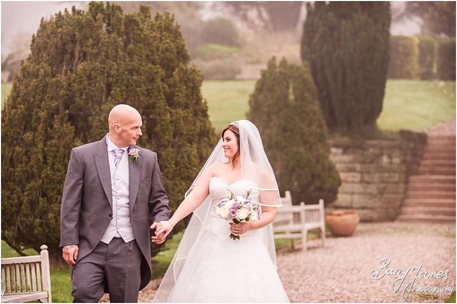 Creative contemporary portraits of the Bride and Groom around the beautiful grounds at Heath House in Tean by Professional Wedding Photographer Barry James