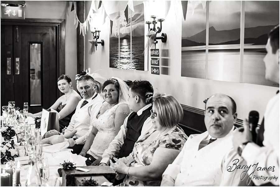 Creative candid photos of the wedding speeches at The Waterfront in Barton Marina by Burton-on-Trent Wedding Photographer Barry James