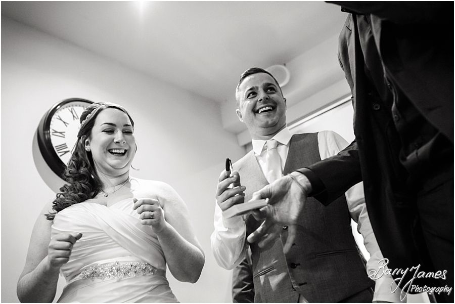 Chris Peskett Magician entertaining the wedding guests at Alrewas Hayes in Burton upon Trent by Contemporary and Candid Wedding Photographer Barry James