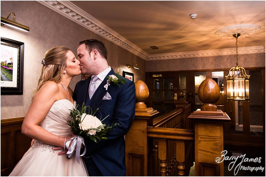 Beautiful relaxed portraits of the bride and groom for their Christmas wedding at The Moat House in Acton Trussell by Wolverhampton Wedding Photographer Barry James