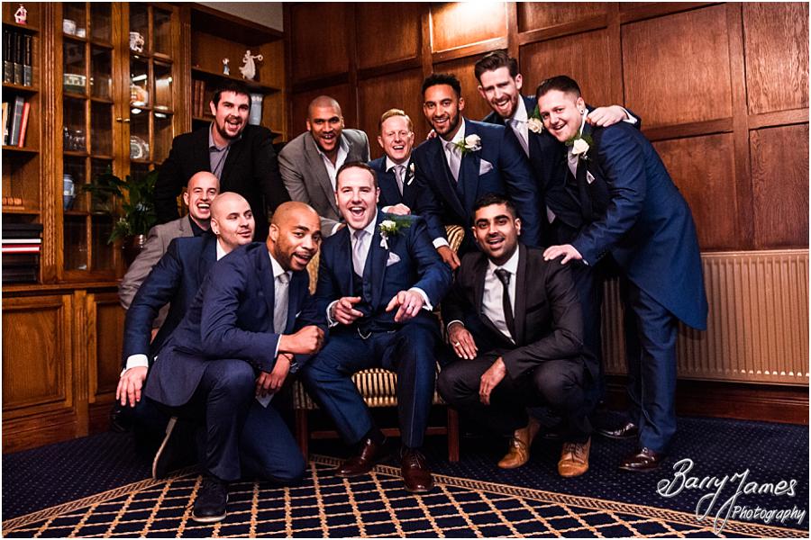 Wedding party fun in the library at The Moat House in Acton Trussell by Wolverhampton Wedding Photographer Barry James
