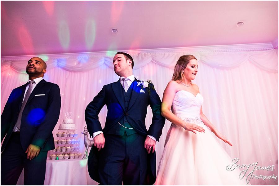 Candid photographs capturing the fun of the wedding reception at The Moat House in Acton Trussell by Wolverhampton Wedding Photographer Barry James