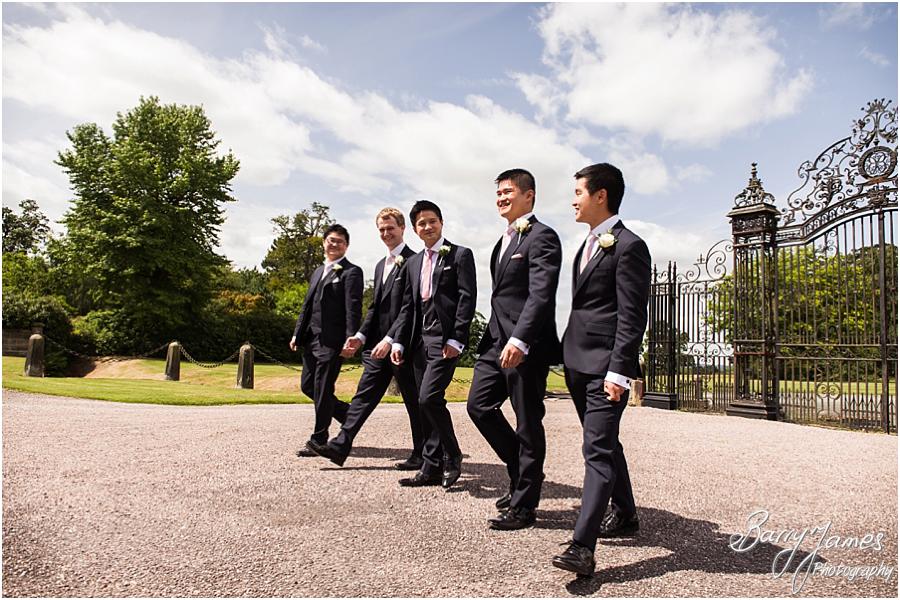 Relaxed natural photos of the Groomsmen at the impressive Sandon Hall in Stafford by Stafford Wedding Photographer Barry James