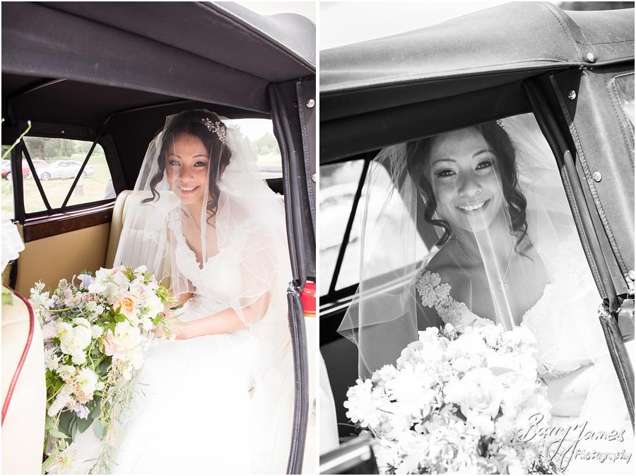 Creative natural photos that capture the arrival of the beaming bride and her father at Sandon Hall in Stafford by Stafford Wedding Photographer Barry James