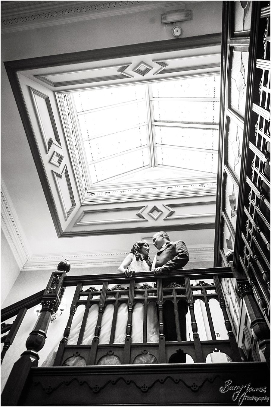 Creative contemporary portraits on the upper landing at Stone House Hotel in Stafford by Stafford Award Winning Wedding Photographer Barry James