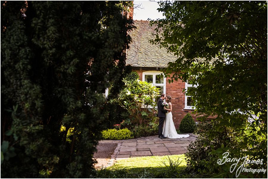 Natural elegant portraits of Bride and Groom around grounds at The Moat House in Penkridge by Venue Recommended Wedding Photographer Barry James