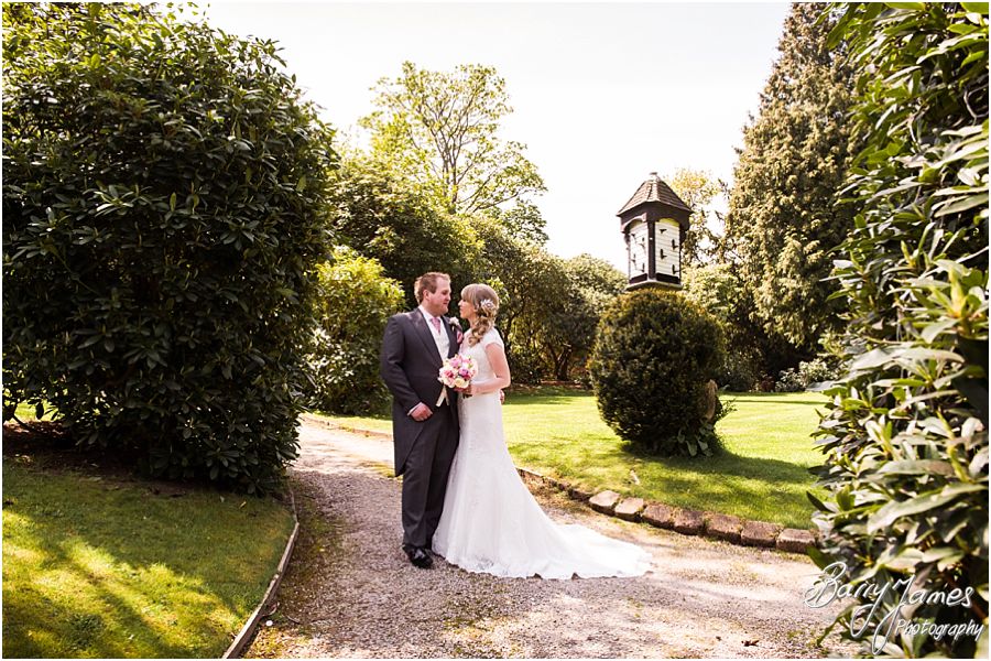 Relaxed portraits of the Bride and Groom in the beautiful grounds at Hawkesyard Hall in Rugeley by Rugeley Professional Wedding Photographer Barry James