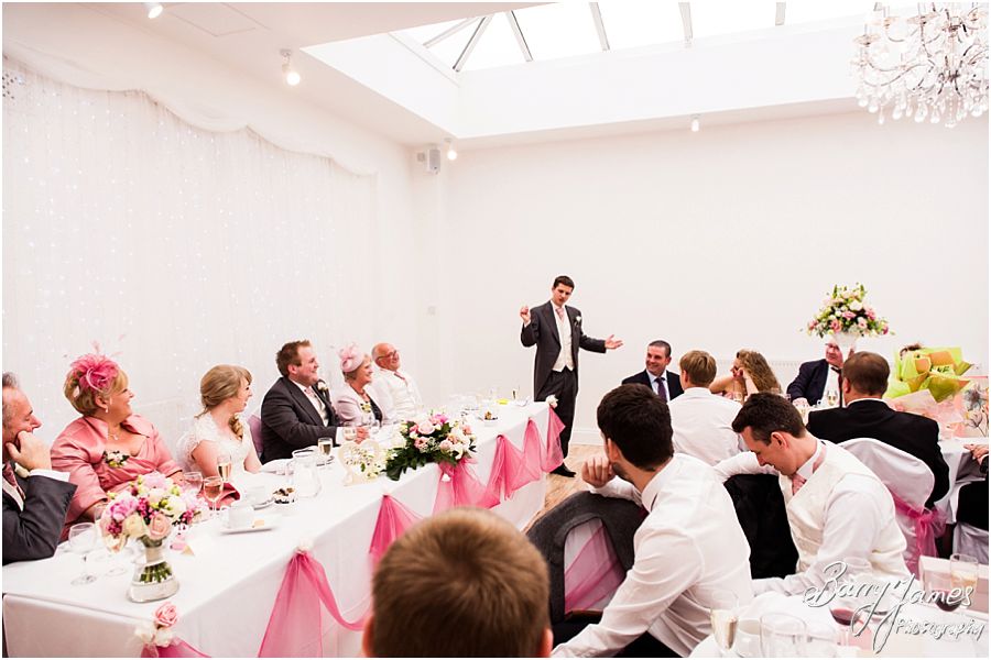 Candid photos of the speeches and fabulous entertaining reactions at Hawkesyard Hall in Rugeley by Venue Recommended Wedding Photographer Barry James