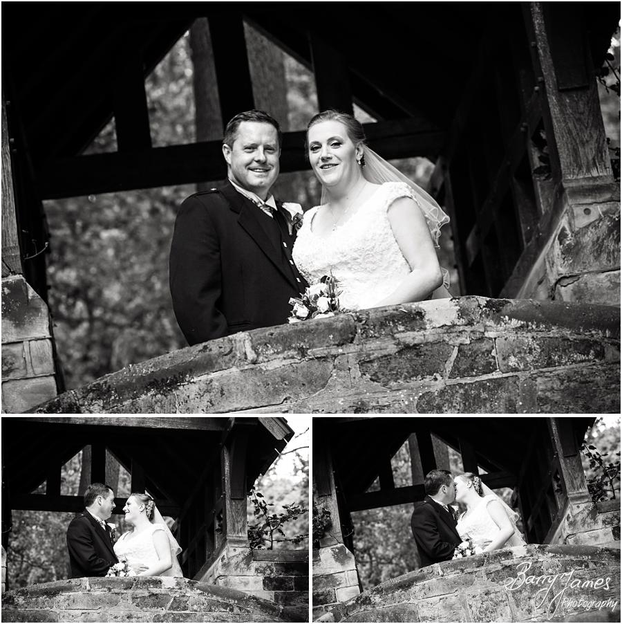Contemporary portraits of the bride and groom in the beautiful gardens at Moor Hall in Sutton Coldfield by Sutton Coldfield Wedding Photographer Barry James