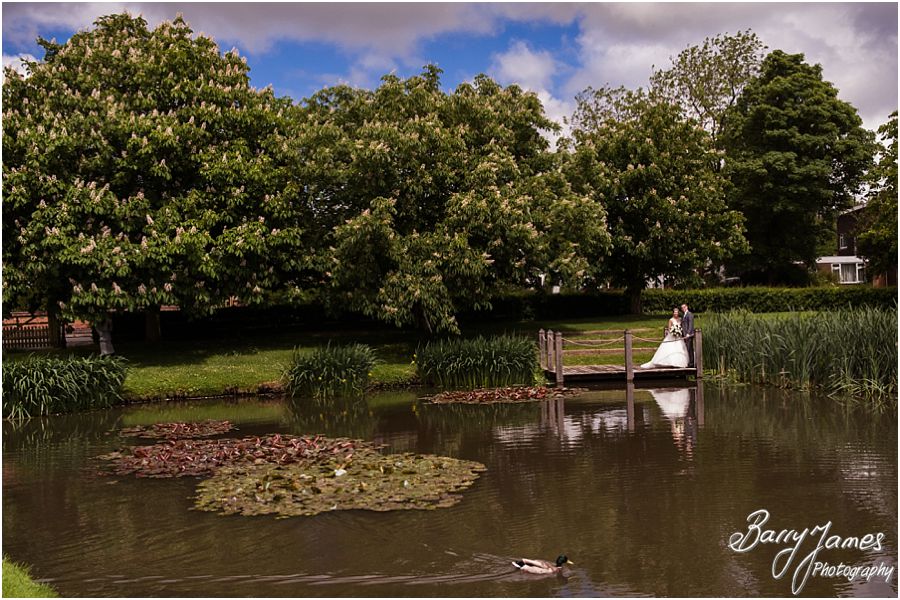 Relaxed unobtrusive moments between the bride and groom around the grounds of The Moat House in Acton Trussell by Contemporary Wedding Photographer Barry James