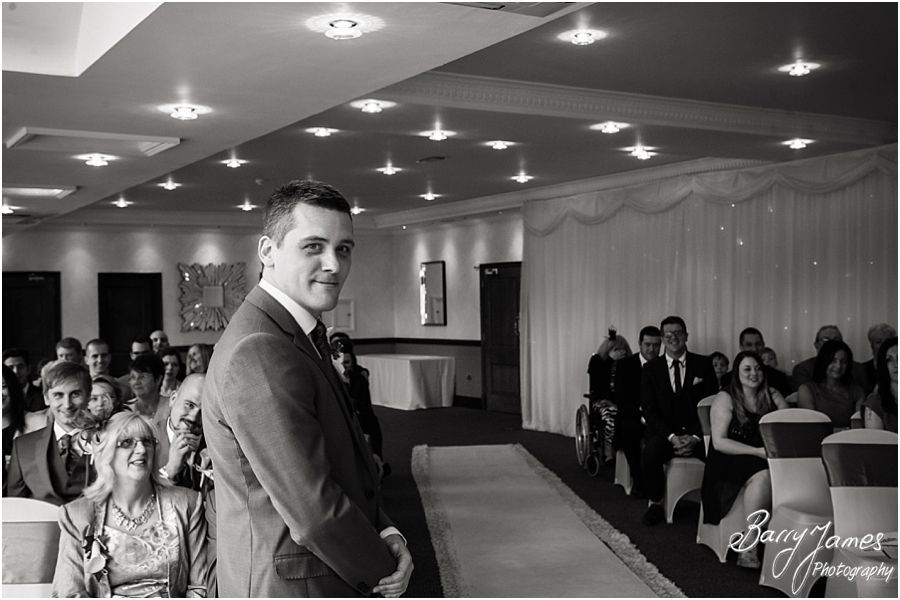 Unobtrusive photos of the wedding ceremony at The Moat House in Acton Trussell by Award Winning Wedding Photographer Barry James