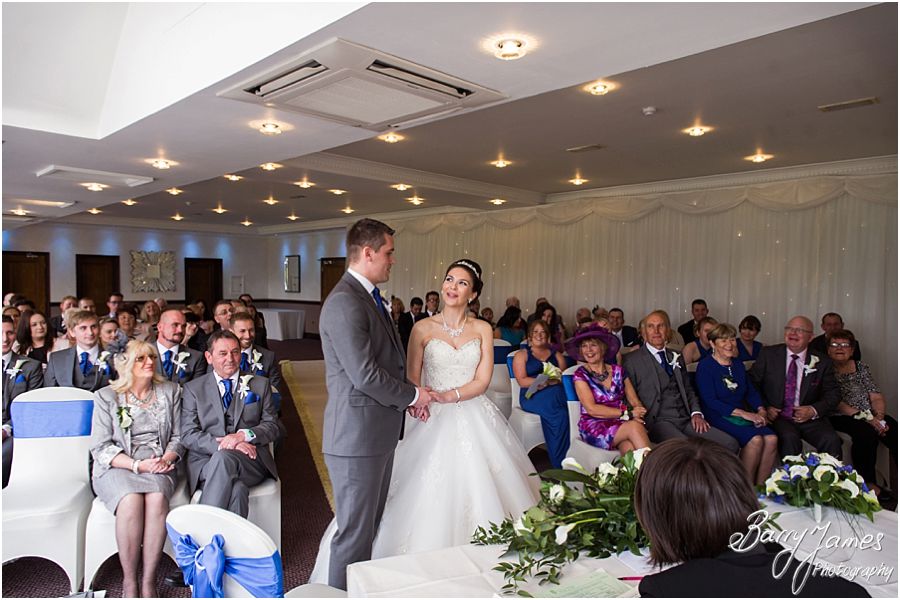 Unobtrusive photos of the wedding ceremony at The Moat House in Acton Trussell by Award Winning Wedding Photographer Barry James