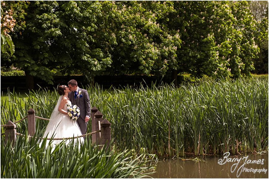 Contemporary and creative portraits of the bride and groom around the grounds of The Moat House in Acton Trussell by Contemporary Wedding Photographer Barry James