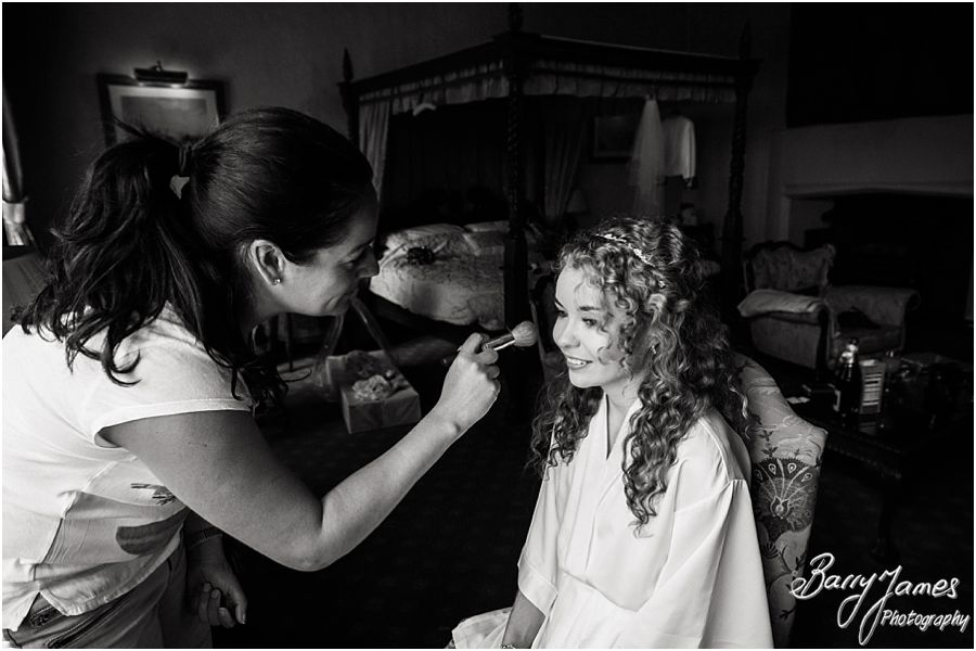 Relaxed morning photographs of bridal preparations at Albright Hussey Manor in Shrewsbury by Candid Wedding Photographer Barry James