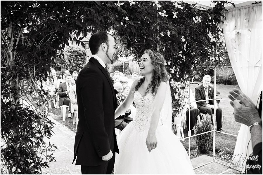 Storytelling photography of the beautiful outdoor ceremony at Albright Hussey Manor in Shrewsbury by Contemporary Wedding Photographer Barry James