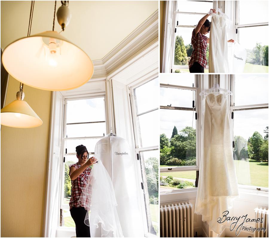 Candid photographs of the bridal preparations at Sandon Hall in Stafford by Stafford Wedding Photographer Barry James