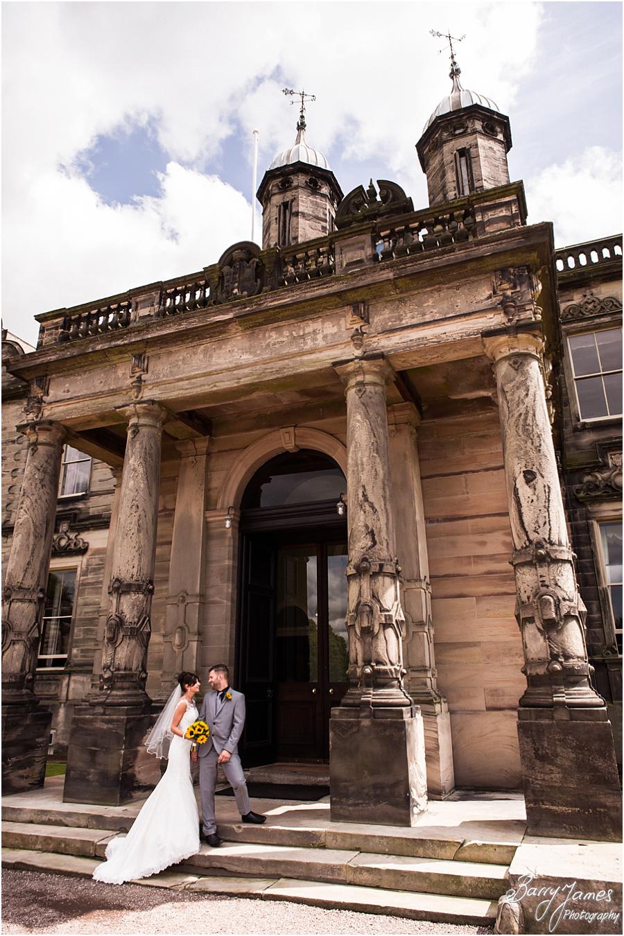 Beautiful portraits on the front of Sandon Hall in Stafford by Stafford Wedding Photographer Barry James