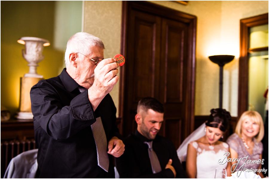 Creative candid photographs that capture the Father of the Bride's speech perfectly at Sandon Hall in Stafford by Stafford Wedding Photographer Barry James