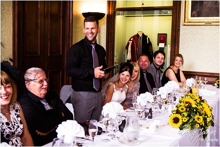 Unobtrusive candid photographs that show the emotion and reaction to the Grooms wedding speech at Sandon Hall in Stafford by Stafford Wedding Photographer Barry James