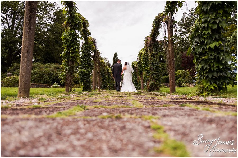 Creative portraits around the wonderful gardens of Sandon Hall in Staffordshire by Recommended Wedding Photographer Barry James