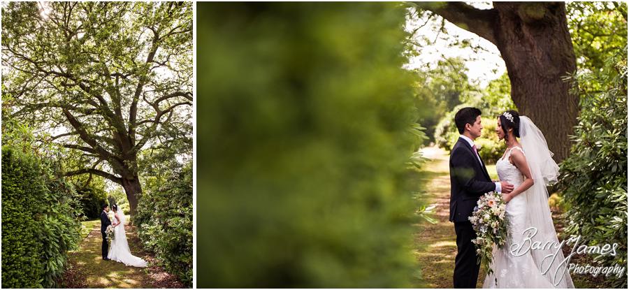 Creative natural portraits of the couple around the stunning setting of Sandon Hall in Stafford by Stafford Wedding Photographer Barry James