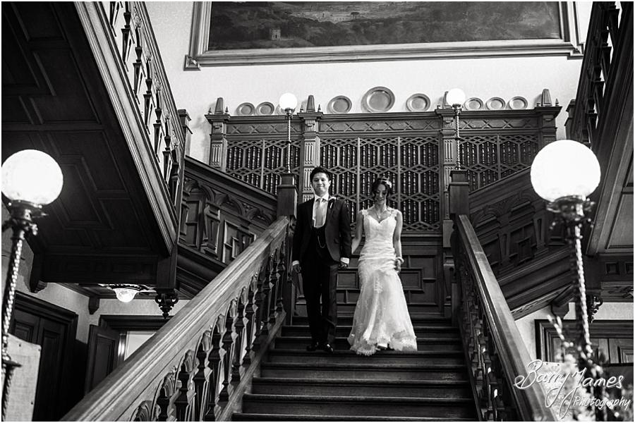 Capturing the fabulous entrance down the grand entrance at Sandon Hall in Stafford by Stafford Wedding Photographer Barry James