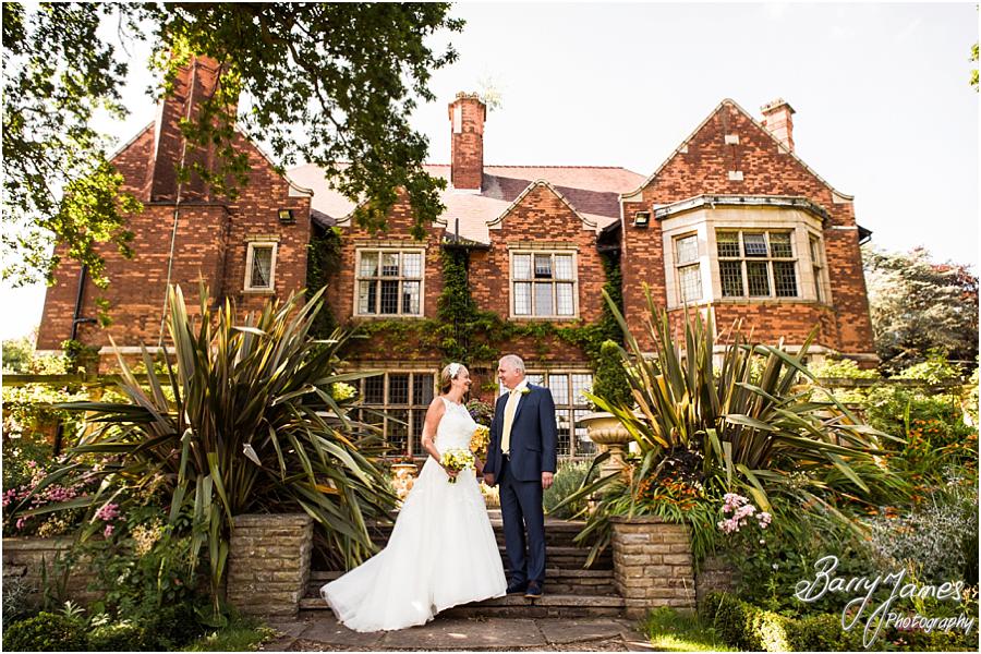 Elegant and natural photographs of the Bride and Groom in the garden at Moxhull Hall in Sutton Coldfield by Sutton Coldfield Wedding Photographer Barry James