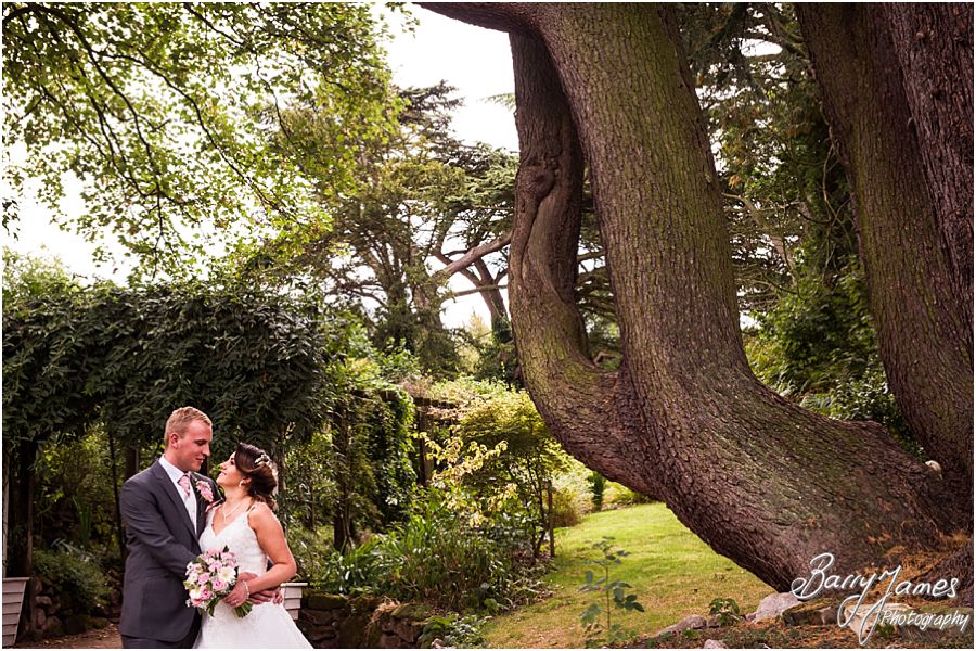 Creative and relaxed photographs of the bride and groom around the grounds at Hawkesyard Estate in Rugeley by Rugeley Wedding Photographer Barry James