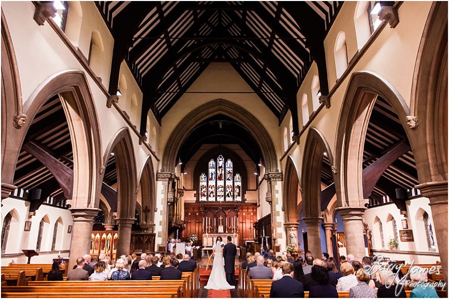 Unobtrusive photographs capturing the beautiful wedding ceremony at St Marys Church Hurst Hill in West Midlands by West Midlands Wedding Photographer Barry James