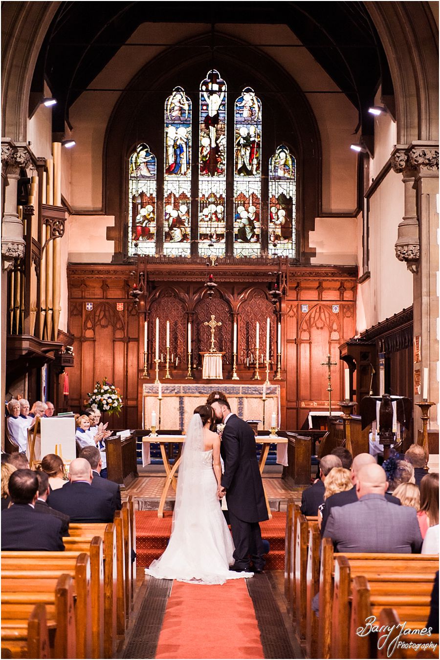 Unobtrusive photographs capturing the beautiful wedding ceremony at St Marys Church Hurst Hill in West Midlands by West Midlands Wedding Photographer Barry James