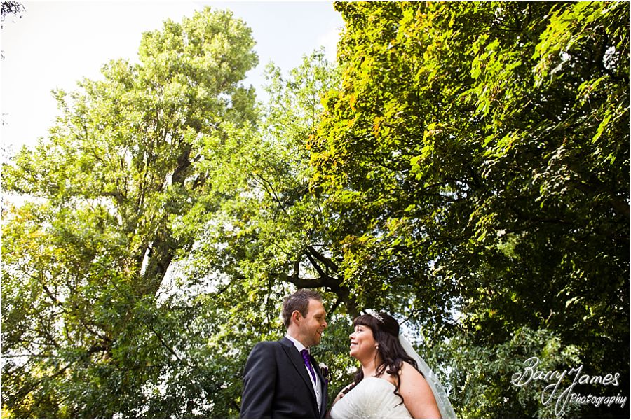 Elegant natural portraits of the bride and groom around the wonderful setting of Walsall Arboretum in Walsall by Walsall Wedding Photographer Barry James