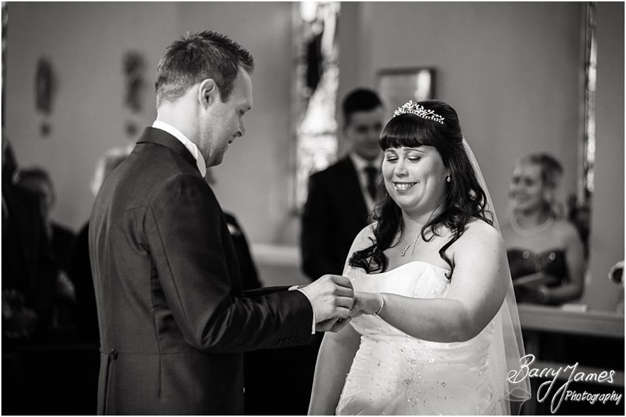 Unobtrusive photographs of the beautiful ceremony at Rushall Parish Church in Walsall by Walsall Wedding Photographer Barry James