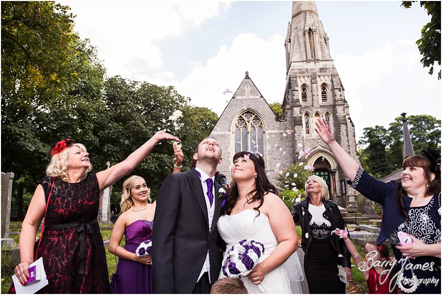 Confetti fun at Rushall Parish Church in Walsall by Walsall Wedding Photographer Barry James