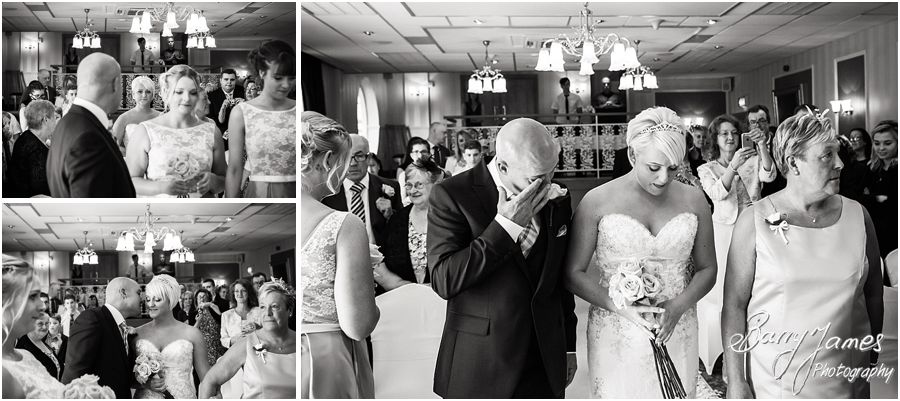 Natural photos of the emotional bridal entrance at The Fairlawns in Walsall by Fairlawns Wedding Photographer Barry James