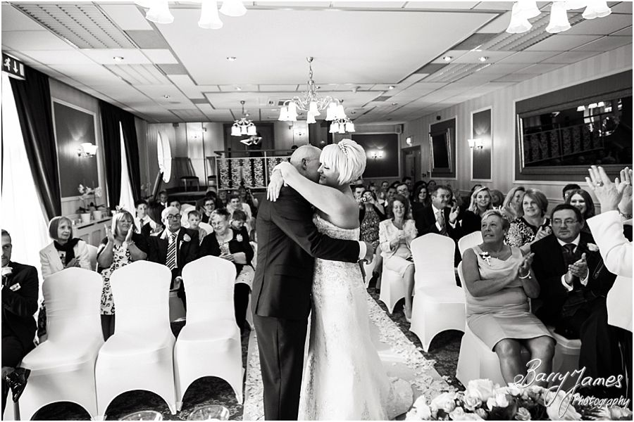 Unobtrusive photos of the wedding ceremony at The Fairlawns in Walsall by Fairlawns Wedding Photographer Barry James